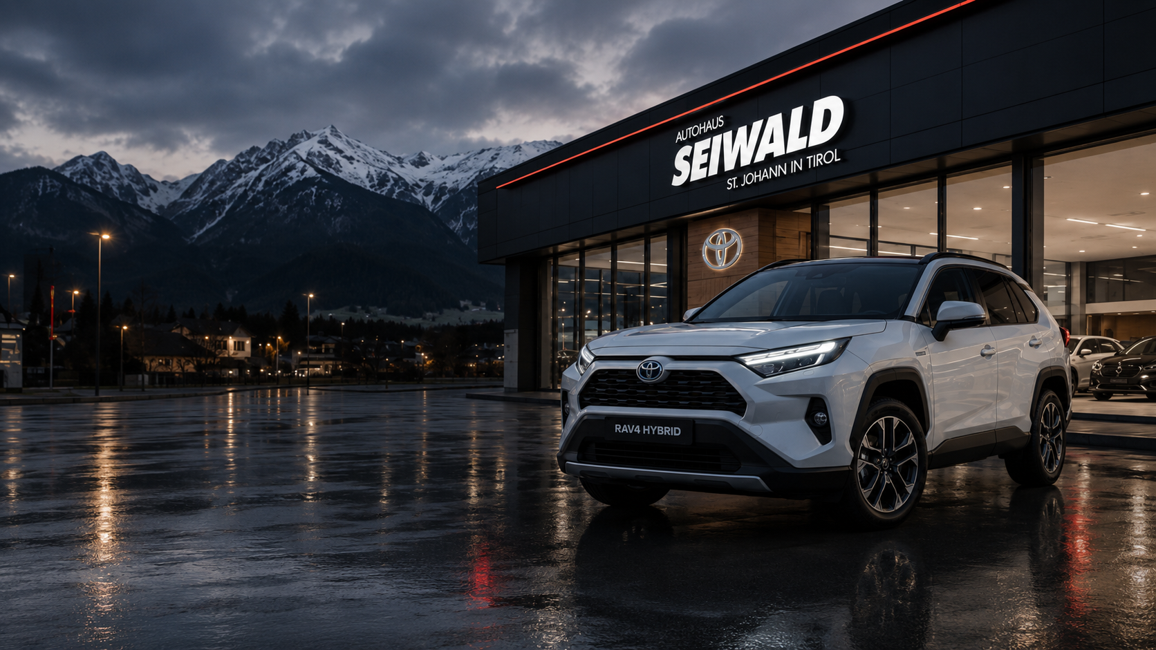 Modernes Fahrzeug vor dem Showroom des Autohaus Seiwald in St. Johann in Tirol